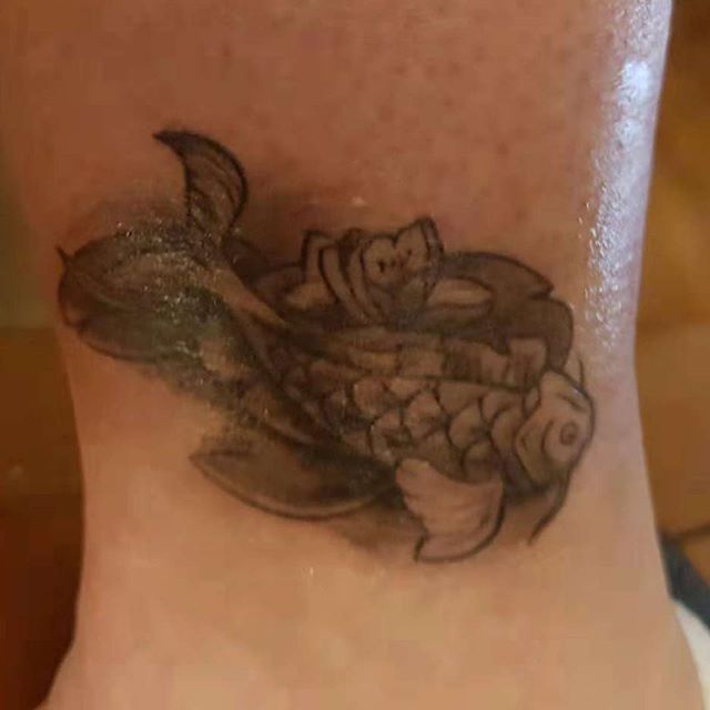 Tatouage du dessin de carpe koi fait par Ciloubidouille